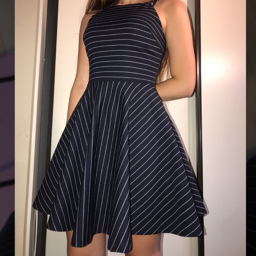 Fit/Flare navy blue dress with white pin stripes